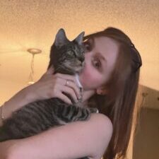 Ryleigh and her cat, Clover.